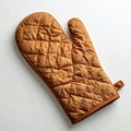 Isolated Quilted Brown Oven Mitt on White Background with Diamond Pattern Royalty Free Stock Photo