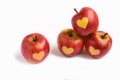 Isolated red apples with shape of heart on a white background Royalty Free Stock Photo