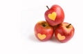 Isolated red apples with shape of heart on a white background Royalty Free Stock Photo