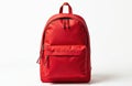 Isolated red backpack for travel or school on white background. Bag has zip closure, handle and front pocket. Accessory is Royalty Free Stock Photo