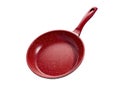 Isolated red kitchen frying pan tilted