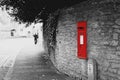 Isolated Red Post Office Box built in a Wall Royalty Free Stock Photo