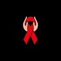 Isolated red ribbon in human hands. Disease awareness. World Aids Day concept. Stop virus icon. International support