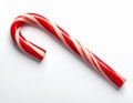 Isolated Red and White Striped Candy Cane on a White Background Royalty Free Stock Photo