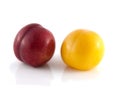 Isolated red and yellow ripe plums (white) Royalty Free Stock Photo
