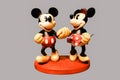 Isolated Retro Mickey and Minnie Mouse Ceramic Figurine