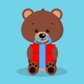 Isolated romantic cute baby brown bear in sitting pose with red gift and blue bow