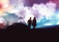 Silhouette of romantic couple stand hugging on meadow at the sunset time . Have a beauty blue sky.