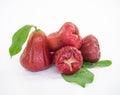 Isolated rose apple with green leaves and water droplets Royalty Free Stock Photo