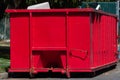 Isolated rugged red industrial dumpster garbage outdoor