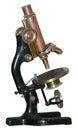 Isolated rusty obsolete vintage microscope Royalty Free Stock Photo
