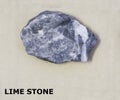 Isolated sample of a Lime Stone rock on texture background. Lime Stone Sedimentary Rock sample. Limestone rock isolated Royalty Free Stock Photo