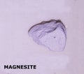 Isolated sample of a Magnesite rock on texture background. Magnesite Sedimentary Rock sample. Magnesite rock isolated Royalty Free Stock Photo