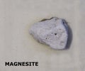 Isolated sample of a Magnesite rock on texture background. Magnesite Sedimentary Rock sample. Magnesite rock isolated Royalty Free Stock Photo