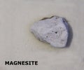 Isolated sample of a Magnesite rock on texture background. Magnesite Sedimentary Rock sample. Magnesite rock isolated Royalty Free Stock Photo