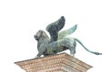 Isolated sculpture of winged lion of Venice at Doge Palace, Venice, Italy