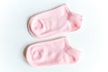 Isolated short baby pink socks on a white Royalty Free Stock Photo