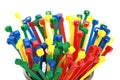 Isolated shot of a bunch of multicolored cable ties on white background Royalty Free Stock Photo