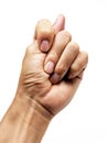Isolated shot of a hand making the offensive fig sign gesture on a white background Royalty Free Stock Photo
