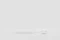 Isolated simple normal white toothbrush is laid on the white background in studio light. Clipping Path Royalty Free Stock Photo
