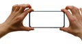 Isolated smartphone in woman`s hands. Blank white screen