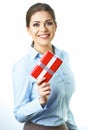 Isolated smiling business woman hold gift box. White background Royalty Free Stock Photo