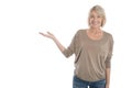 Isolated smiling older or mature woman presenting with hand over Royalty Free Stock Photo