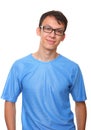 Isolated smiling standing young man blue