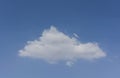 Isolated Soft and Fluffy Triangular Cloud in a Pure Blue Sky Royalty Free Stock Photo