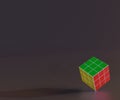 Isolated solved puzzle cube in the black background