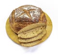 Sourdough bread on a bread board on a white background Royalty Free Stock Photo