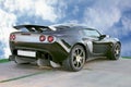 Isolated sport black car on blue sky background