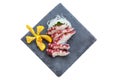 Isolated Squid Tentacle Sashimi served with Sliced Radish Royalty Free Stock Photo