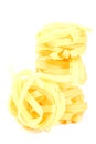 Isolated stack of pasta tagliatelle Royalty Free Stock Photo
