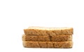 Isolated stack of three whole wheat bread on white background. Close-up image, side view of bread Royalty Free Stock Photo
