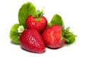 Isolated strawberries. Three fruits, one cut in half on white background Royalty Free Stock Photo