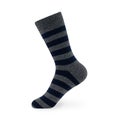 Isolated striped long men`s sock on invisible mannequin foot on white background, side view. Royalty Free Stock Photo