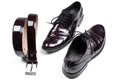 Isolated stylish leather men's dress shoes and belt Royalty Free Stock Photo