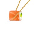 Isolated sushi roll in chopsticks Royalty Free Stock Photo