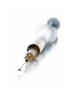 Isolated syringe focus on drop Royalty Free Stock Photo