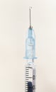 isolated syringe and needle with droplet Royalty Free Stock Photo