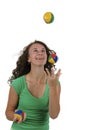 Isolated teenage girl juggling