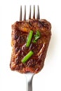 Isolated tender beef slice on a fork against a transparent background for culinary purposes, cut out, stock image Royalty Free Stock Photo