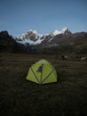 Isolated tent with donkeys mule idyllic mountain camping panorama Cordillera Huayhuash Circuit Ancash Huanuco Peru andes