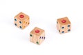 Isolated Three wood dice show one point face