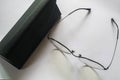 Isolated top view of eyeglasses with leather case