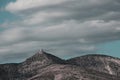 Isolated tower perched on an arid and Mediterranean hill Royalty Free Stock Photo