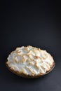 Isolated traditional holiday dessert of coconut meringue pie on