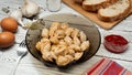 Isolated traditional russian pelmeni, ravioli, dumplings with meat on wood background. Design and food styling idea for