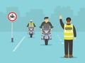 Isolated traffic police officer makes a stop gesture with his hand and pulls over motorcycle riders. No motorcycle sign area.